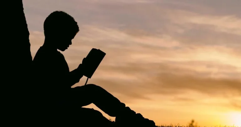 Silhouette-of-kid-reading-book-Website